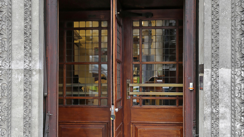 A vintage-style wooden revolving door