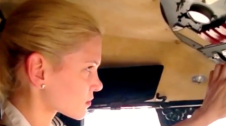 Nadia Marcinko piloting a plane 