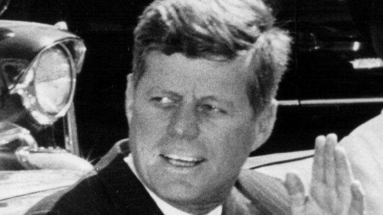 JFK riding in a parade