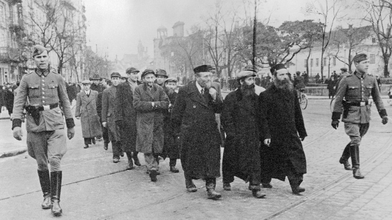 Persecuted Jews marched concentration camp