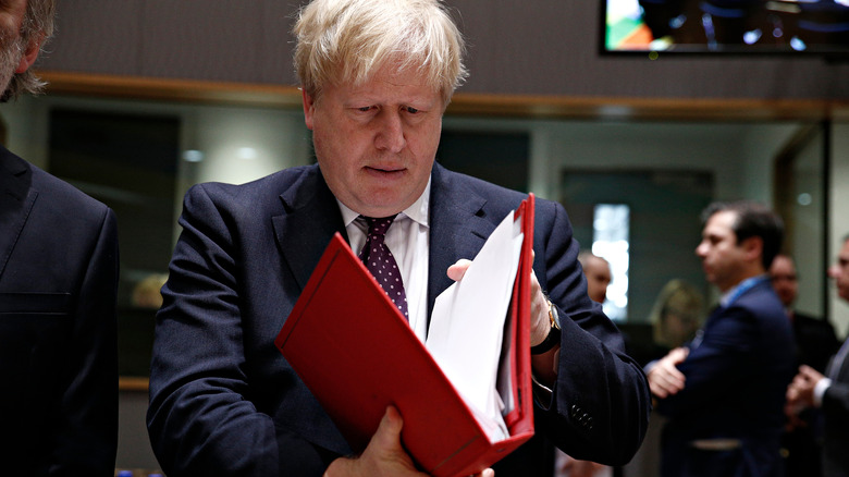 Boris Johnson with binder
