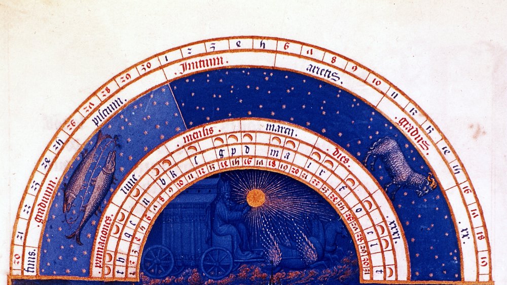 Pisces and Aries, the signs of the zodiac for the month, are depicted in the sky above a castle in the background. 