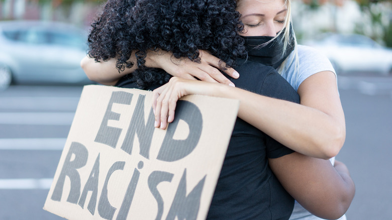 end racism sign