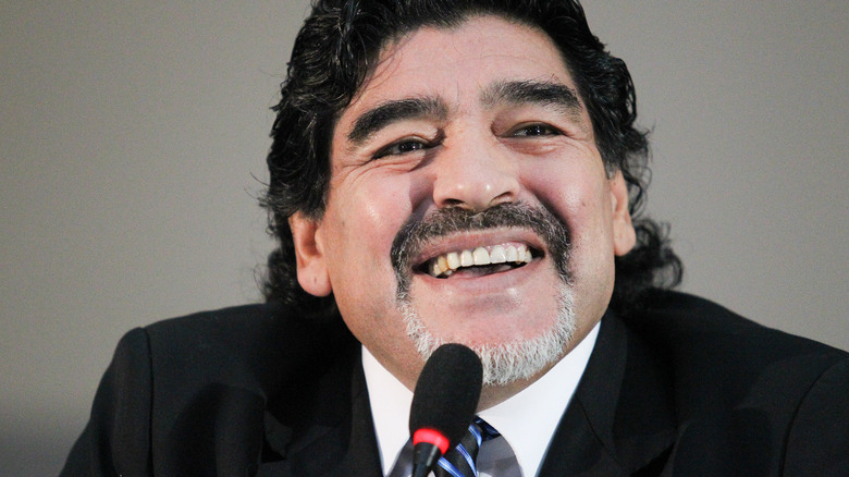 Maradona at a press conference