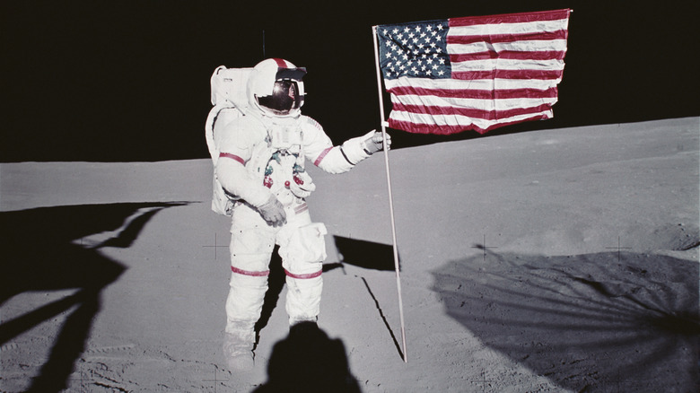 Alan Shepard on moon with flag