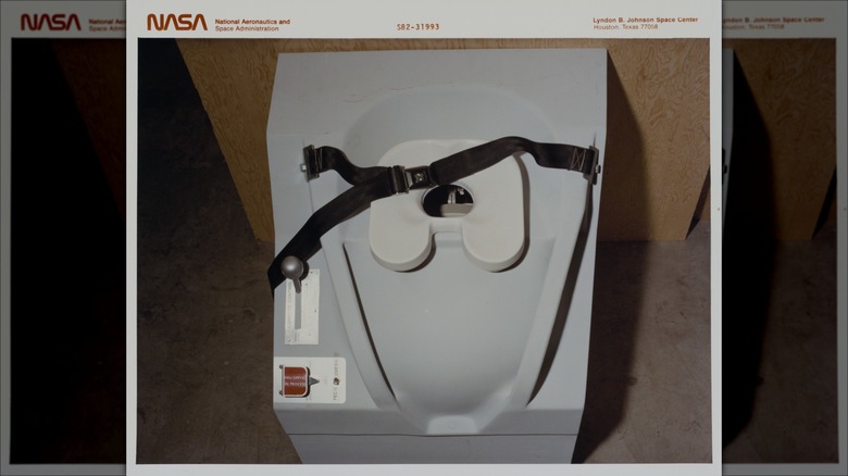 NASA toilet with strap
