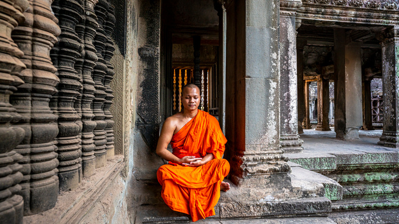 Buddhist monk sitting in meditation