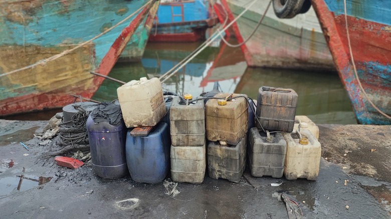 Chemical containers dock fishing boat