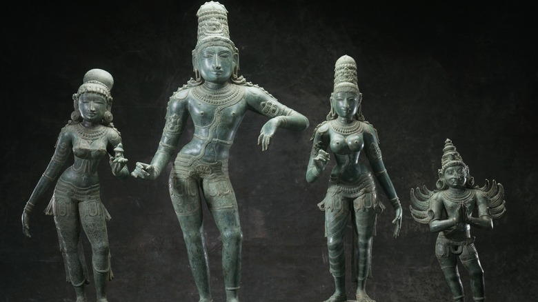 Statue of Krishna and his wives, 12-13th century