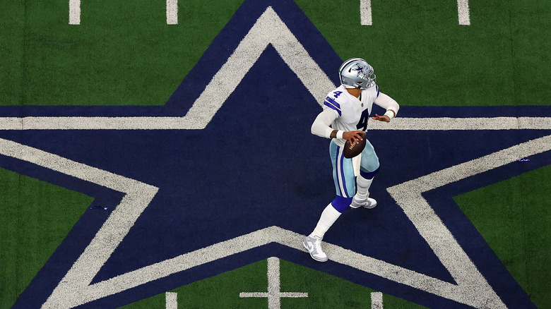 Football player on Cowboys logo