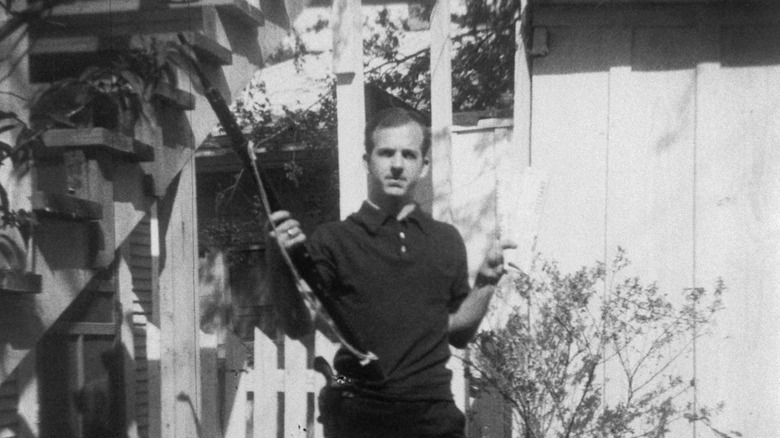 Lee Harvey Osward with rifle