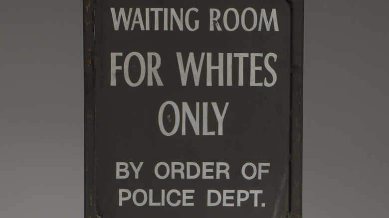 Whites only sign