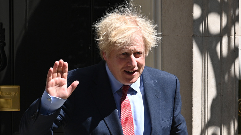 Boris Johnson waving outside 10 Downing Street