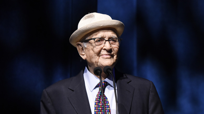 Norman Lear in hat and glasses