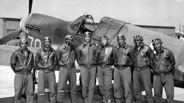 Black pilots standing together World War II