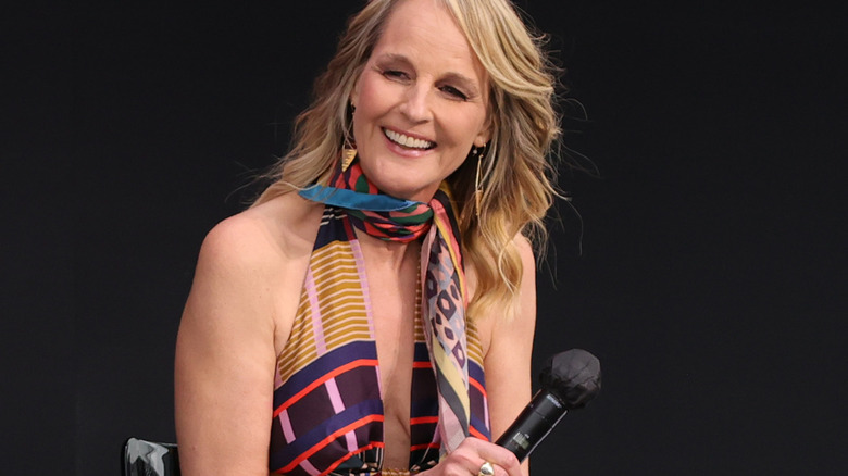 Helen Hunt smiling interview holding mic