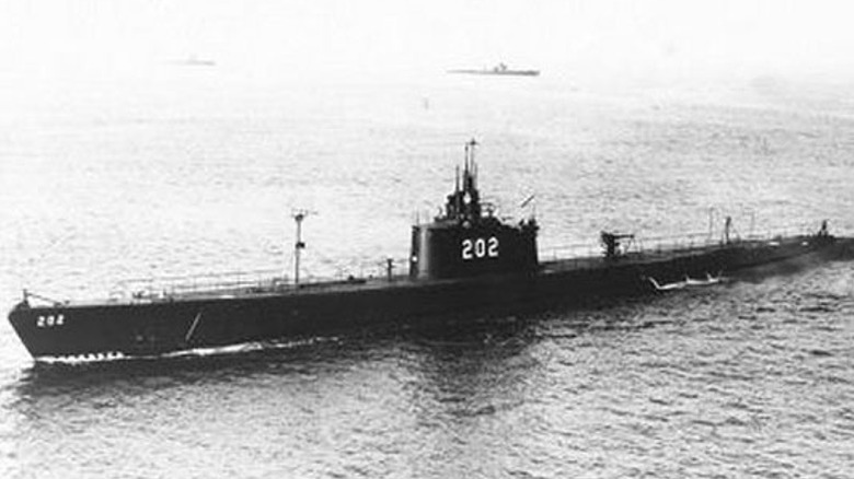 USS Trout dark submarine on the surface