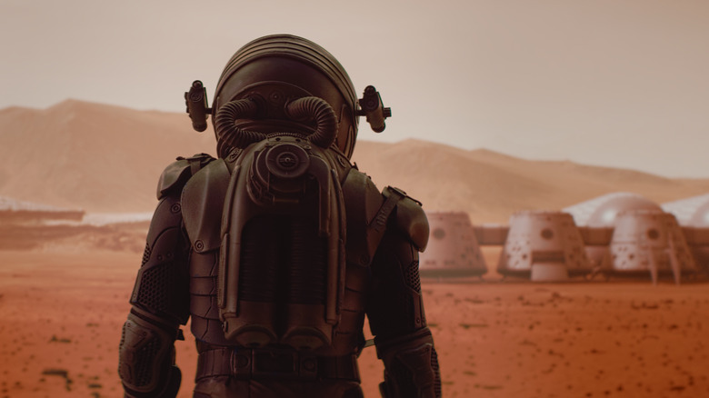 person in space suit on Mars